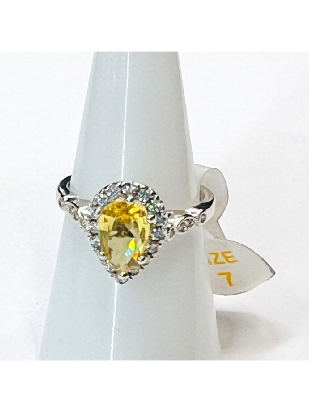 Ring Bomb Party Ring,  size 7, yellow stone, silver color band, CZ type minis